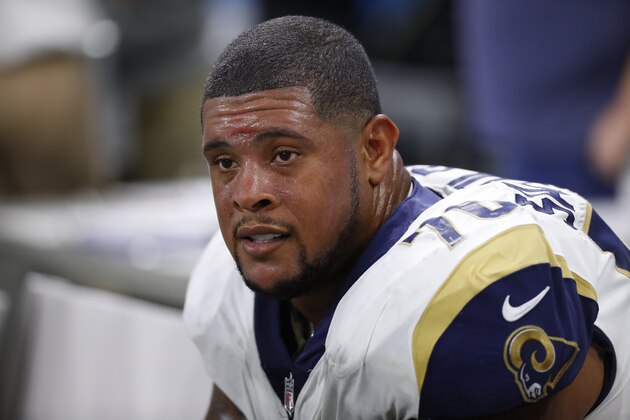 Los Angeles Rams offensive guard Rodger Saffold watches against the Detroit Lions during an NFL football game in Detroit, Sunday, Dec. 2, 2018. (AP Photo/Paul Sancya)