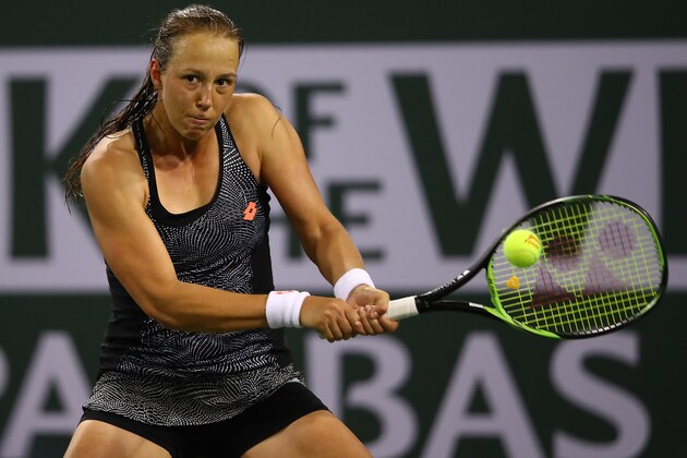 INDIAN WELLS, CALIFORNIA - MARCH 06: Vera Lapko of Belarus plays a backhand against Victoria Azarenka of Belarus during their womens singles first round match on day three of the BNP Paribas Open at the Indian Wells Tennis Garden on March 06, 2019 in Indian Wells, California. (Photo by Clive Brunskill/Getty Images)