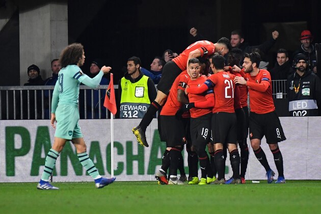 Rennes' players celebrate their second goal during the UEFA Europa League round of 16 first leg football match between Stade Rennais FC and Arsenal FC at the Roazhon Park stadium in Rennes, northwestern France on March 7, 2019. (Photo by DAMIEN MEYER / AFP)        (Photo credit should read DAMIEN MEYER/AFP/Getty Images)