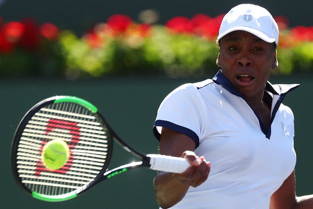 INDIAN WELLS, CALIFORNIA - MARCH 07: Venus Williams of the United States plays a forehand against Andrea Petkovic of Germany during their women's singles first round match against on Day 4 of the BNP Paribas Open at the Indian Wells Tennis Garden on March 07, 2019 in Indian Wells, California. (Photo by Yong Teck Lim/Getty Images)