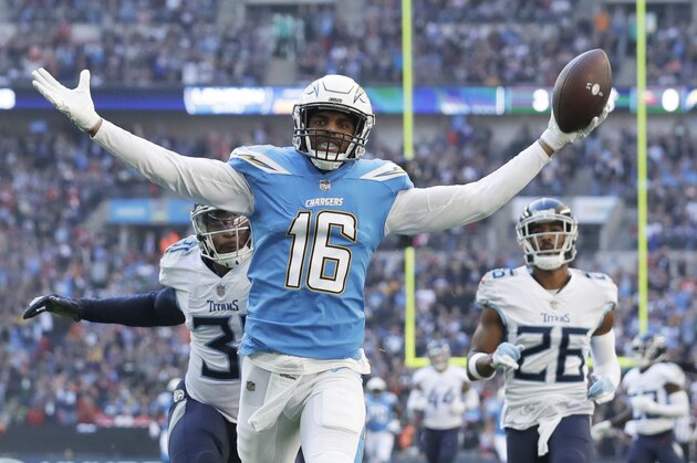 Los Angeles Chargers wide receiver Tyrell Williams (16) celebrates as he scores a touchdown during the first half of an NFL football game against Tennessee Titans at Wembley stadium in London, Sunday, Oct. 21, 2018. (AP Photo/Matt Dunham)