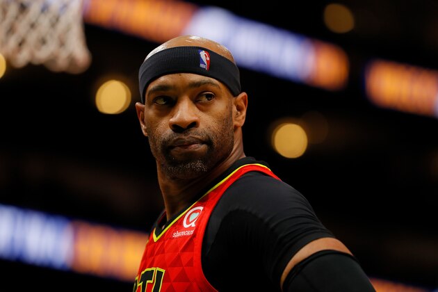 ATLANTA, GEORGIA - MARCH 06:  Vince Carter #15 of the Atlanta Hawks reacts after their 111-104 loss to the San Antonio Spurs at State Farm Arena on March 06, 2019 in Atlanta, Georgia.  NOTE TO USER: User expressly acknowledges and agrees that, by downloading and or using this photograph, User is consenting to the terms and conditions of the Getty Images License Agreement.  (Photo by Kevin C.  Cox/Getty Images)