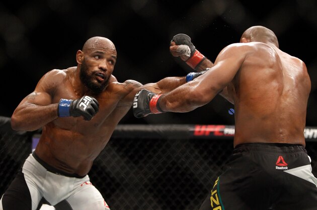 LAS VEGAS, NV - DECEMBER 12:  Yoel Romero (L) punches Ronaldo Souza in a middleweight fight during UFC 194 on December 12, 2015 in Las Vegas, Nevada.  (Photo by Steve Marcus/Getty Images)