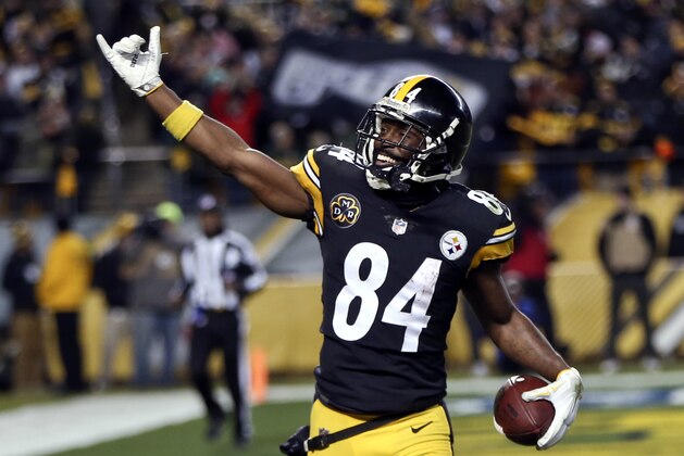 FILE - In this Nov. 26, 2017, file photo, Pittsburgh Steelers wide receiver Antonio Brown (84) celebrates during an NFL football game against the Green Bay Packers in Pittsburgh. Brown is making a push as a fringe candidate for the NFL’s Most Valuable Player award. He leads the league in receptions and yards receiving heading into Sunday's visit to Cincinnati. (AP Photo/Keith Srakocic, File)