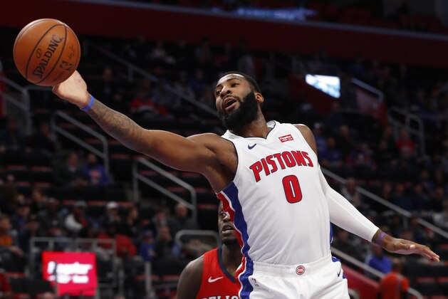 Detroit Pistons center Andre Drummond pulls down a rebound against the New Orleans Pelicans in the first half of an NBA basketball game in Detroit, Sunday, Dec. 9, 2018. (AP Photo/Paul Sancya)