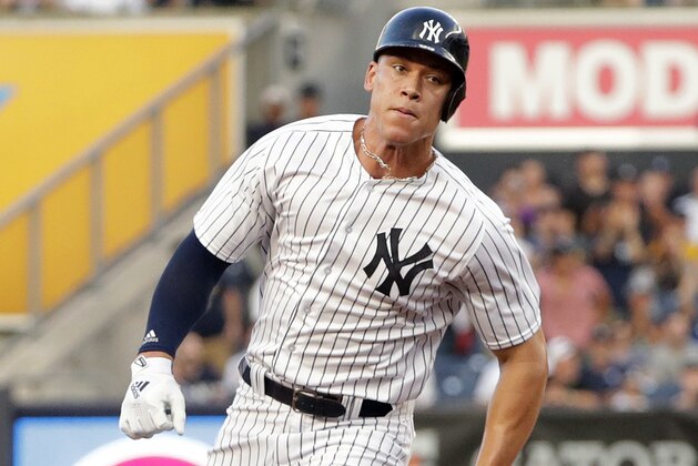 New York Yankees' Aaron Judge runs to third base on a double by Didi Gregorius during the first inning of the team's baseball game against the Kansas City Royals on Thursday, July 26, 2018, in New York. (AP Photo/Frank Franklin II)
