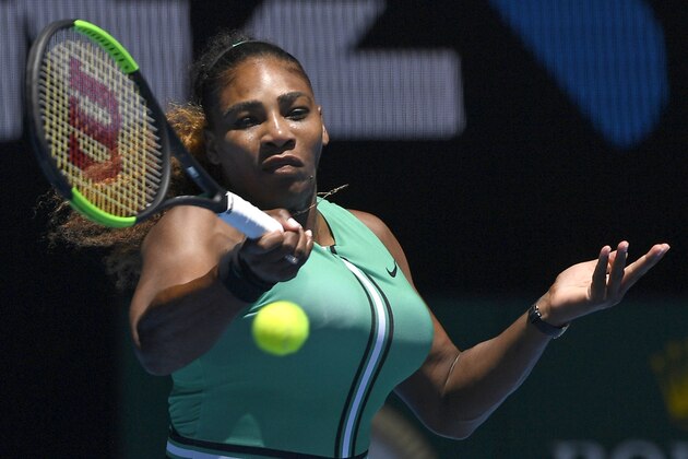 United States' Serena Williams makes a forehand return to Karolina Pliskova of the Czech Republic during their quarterfinal match at the Australian Open tennis championships in Melbourne, Australia, Wednesday, Jan. 23, 2019. (AP Photo/Andy Brownbill)