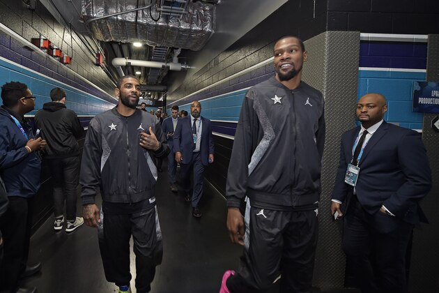 CHARLOTTE, NC - FEBRUARY 17: Kyrie Irving #11 and Kevin Durant #35 of Team LeBron are seen before the game against Team Giannis during the 2019 NBA All-Star Game on February 17, 2019 at Spectrum Center in Charlotte, North Carolina. NOTE TO USER: User expressly acknowledges and agrees that, by downloading and or using this photograph, User is consenting to the terms and conditions of the Getty Images License Agreement. Mandatory Copyright Notice: Copyright 2019 NBAE (Photo by Tom O'Connor/NBAE via Getty Images)