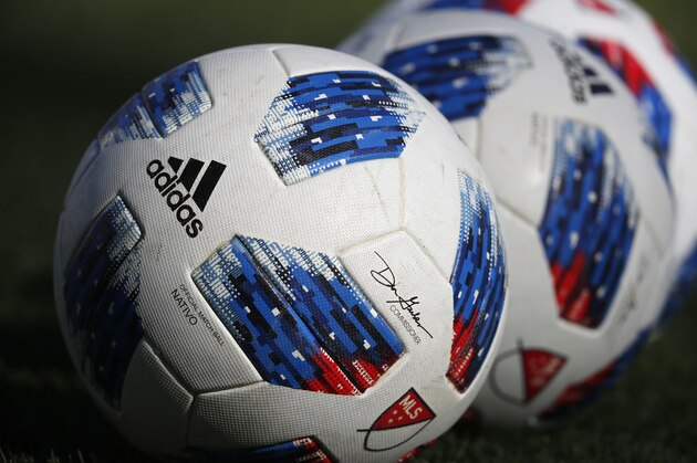 Adidas soccer balls in the first half of an MLS soccer match Sunday, Oct. 28, 2018, in Commerce City, Colo. (AP Photo/David Zalubowski)
