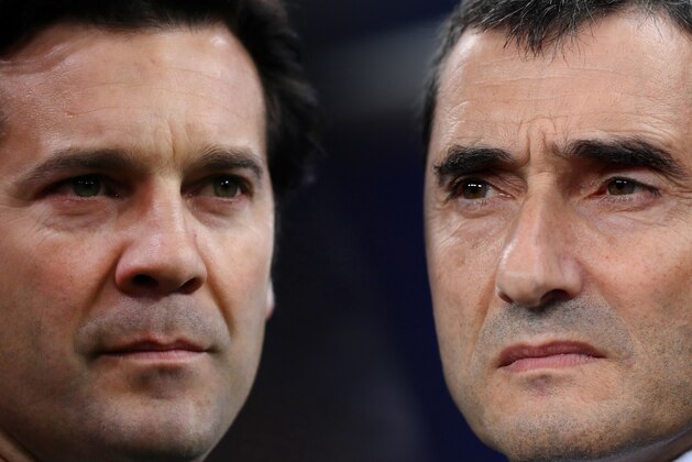 FILE PHOTO (EDITORS NOTE: COMPOSITE OF IMAGES - Image numbers 1124707375,1045108782 - GRADIENT ADDED) In this composite image a comparison has been made between Santiago Solari, Manager of Real Madrid (L) and  Ernesto Valverde, Manager of Barcelona. Real Madrid CF and FC Barcelona meet in El Classico on March 2, 2019 at the Estadio Santiago Bernabeu in Madrid,Spain.   ***LEFT IMAGE*** AMSTERDAM, NETHERLANDS - FEBRUARY 13: Santiago Solari, Manager of Real Madrid looks on prior to the UEFA Champions League Round of 16 First Leg match between Ajax and Real Madrid at Johan Cruyff Arena on February 13, 2019 in Amsterdam, Netherlands. (Photo by Dean Mouhtaropoulos/Getty Images) ***RIGHT IMAGE***  LONDON, ENGLAND - OCTOBER 03: Ernesto Valverde, Manager of Barcelona looks on prior to the Group B match of the UEFA Champions League between Tottenham Hotspur and FC Barcelona at Wembley Stadium on October 3, 2018 in London, United Kingdom. (Photo by Laurence Griffiths/Getty Images)
