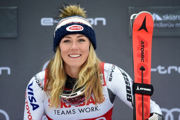 First placed Mikaela Shiffrin of US celebrates on the podium after the women's slalom at the FIS Ski World cup in Spindleruv Mlyn, Czech Republic, on March 9, 2019. (Photo by Michal CIZEK / AFP)        (Photo credit should read MICHAL CIZEK/AFP/Getty Images)