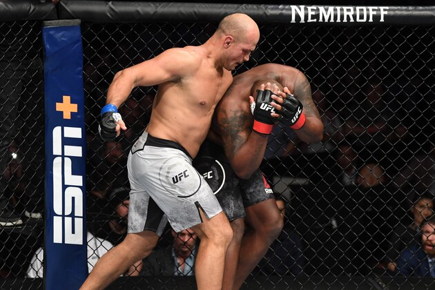 WICHITA, KS - MARCH 09:  (L-R) Junior Dos Santos of Brazil punches Derrick Lewis in their heavyweight bout during the UFC Fight Night event at Intrust Bank Arena on March 9, 2019 in Wichita, Kansas. (Photo by Josh Hedges/Zuffa LLC/Zuffa LLC via Getty Images)