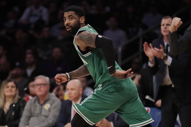 Boston Celtics' Kyrie Irving runs down to court after making a basket during the second half of an NBA basketball game against the Los Angeles Lakers, Saturday, March 9, 2019, in Los Angeles. The Celtics won 120-107. (AP Photo/Jae C. Hong)