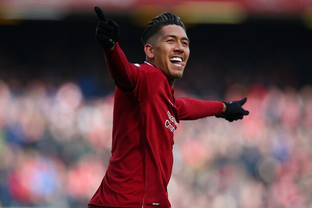 LIVERPOOL, ENGLAND - MARCH 10: Roberto Firmino of Liverpool FC celebrates after scoring his second goal during the Premier League match between Liverpool FC and Burnley FC at Anfield on March 10, 2019 in Liverpool, United Kingdom. (Photo by Alex Livesey - Danehouse/Getty Images)