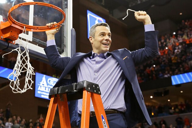 CHARLOTTESVILLE, VA - MARCH 09: Head coach Tony Bennett of the Virginia Cavaliers cuts down the net after winning a game against the Louisville Cardinals to a clinch a share of the ACC regular season title at John Paul Jones Arena on March 9, 2019 in Charlottesville, Virginia. (Photo by Ryan M. Kelly/Getty Images)