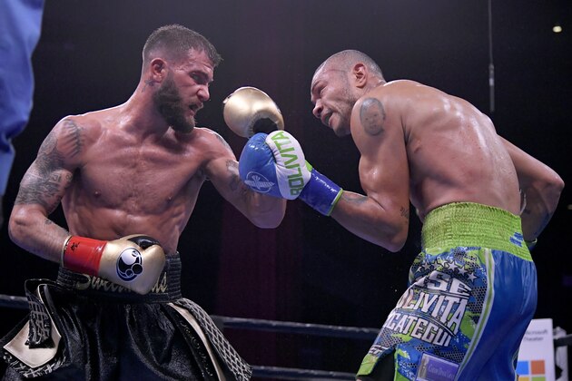 LOS ANGELES, CA - JANUARY 13: Caleb Plant in black trunks and Jose Uzcategui battle in the IBF Super Middleweight Championship 12 round match at Microsoft Theater on January 13, 2019 in Los Angeles, California. Plant won by unanimous decision. (Photo by John McCoy/Getty Images)