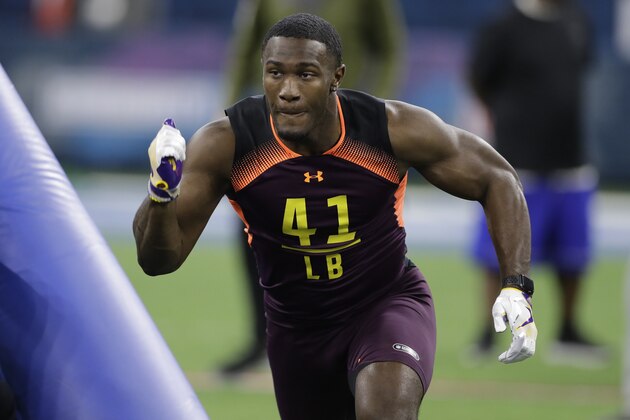 LSU linebacker Devin White runs a drill during the NFL football scouting combine, Sunday, March 3, 2019, in Indianapolis. (AP Photo/Darron Cummings)