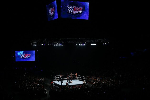 Wrestlers fight during a show at the AccorHotels Arena in Paris, as part of the WrestleMania Revenge Tour, the World Wrestling Entertainment (WWE) European tour, on April 22, 2016. / AFP / THOMAS SAMSON        (Photo credit should read THOMAS SAMSON/AFP/Getty Images)