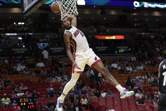 Miami Heat forward Derrick Jones Jr. (5) dunks during the second half of an NBA basketball game against the Toronto Raptors, Sunday, March 10, 2019, in Miami. The Raptors won 125-104. (AP Photo/Lynne Sladky)