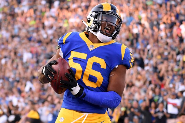 LOS ANGELES, CA - NOVEMBER 11:  Dante Fowler #56 of the Los Angeles Rams celebrates his sack and fumble recovery in the fourth quarter during a 36-31 win over the Seattle Seahawks at Los Angeles Memorial Coliseum on November 11, 2018 in Los Angeles, California.  (Photo by Harry How/Getty Images)