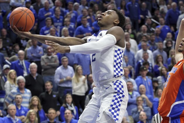 Kentucky's Ashton Hagans (2) shoots near Florida's Isaiah Stokes, right, during the second half of an NCAA college basketball game in Lexington, Ky., Saturday, March 9, 2019. Kentucky won 66-57. (AP Photo/James Crisp)