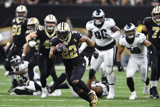 New Orleans Saints running back Mark Ingram (22) runs against the Philadelphia Eagles in the second half of an NFL divisional playoff football game in New Orleans, Sunday, Jan. 13, 2019. (AP Photo/Bill Feig)