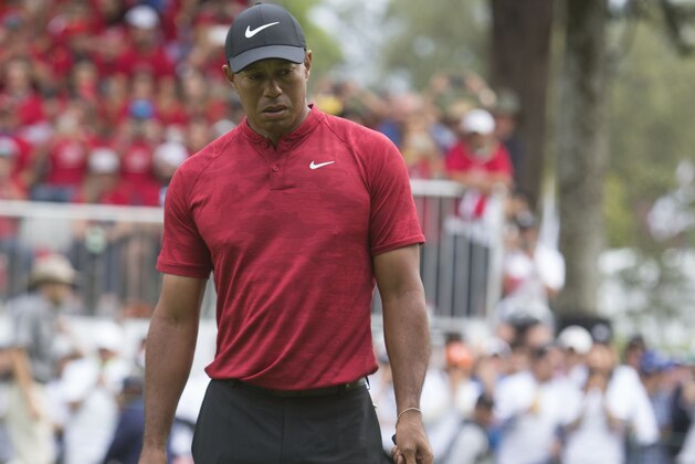U.S. golfer Tiger Woods walks away at the end of the Mexico Championship at Chapultepec Golf Club in Mexico City, Sunday, Feb. 24, 2019. Woods got his first top 10 of the year at the tournament. (AP Photo/Christian Palma)