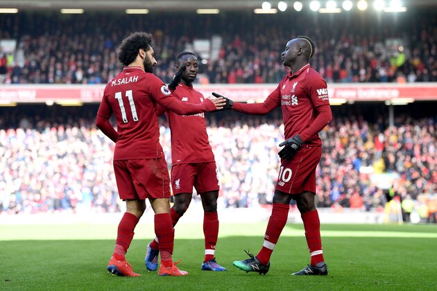 LIVERPOOL, ENGLAND - MARCH 10: Sadio Mane of Liverpool celebrates with his teammates after scoring his sides fourth goal during the Premier League match between Liverpool FC and Burnley FC at Anfield on March 10, 2019 in Liverpool, United Kingdom. (Photo by Michael Regan/Getty Images)
