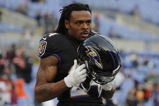 Baltimore Ravens cornerback Brandon Carr (24) stands on the field during warmups before an NFL football game against the Cleveland Browns, Sunday, Dec. 30, 2018, in Baltimore. (AP Photo/Carolyn Kaster)