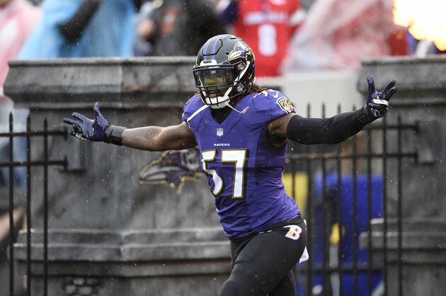 Baltimore Ravens inside linebacker C.J. Mosley runs onto the field before an NFL football game against the Tampa Bay Buccaneers, Sunday, Dec. 16, 2018, in Baltimore. (AP Photo/Nick Wass)