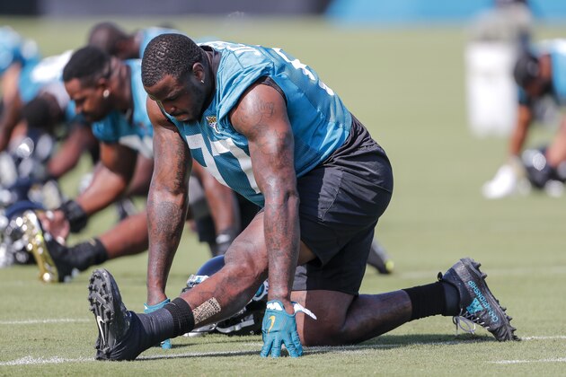 JACKSONVILLE, FL - JULY 27: Defensive Tackle Malik Jackson #97 of the Jacksonville Jaguars loosen up before the start of Training Camp at Dream Finders Homes Practice Complex on July 27, 2018 in Jacksonville, Florida. (Photo by Don Juan Moore/Getty Images)