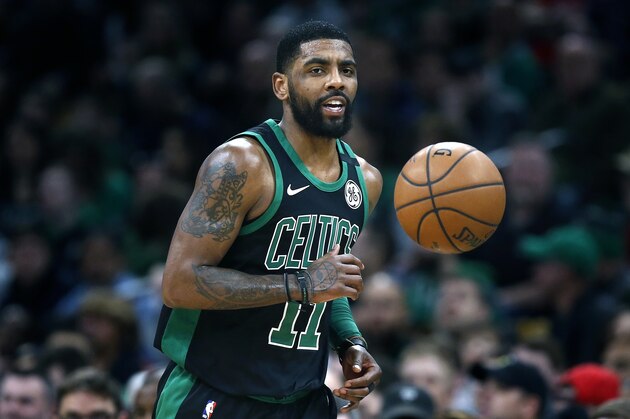 Boston Celtics' Kyrie Irving plays against the Houston Rockets during the first half of an NBA basketball game in Boston, Sunday, March 3, 2019. (AP Photo/Michael Dwyer)