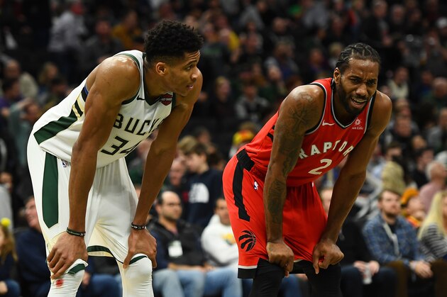 MILWAUKEE, WISCONSIN - JANUARY 05:  Giannis Antetokounmpo #34 of the Milwaukee Bucks and Kawhi Leonard #2 of the Toronto Raptors wait for a free throw during a game at Fiserv Forum on January 05, 2019 in Milwaukee, Wisconsin.  NOTE TO USER: User expressly acknowledges and agrees that, by downloading and or using this photograph, User is consenting to the terms and conditions of the Getty Images License Agreement. (Photo by Stacy Revere/Getty Images)