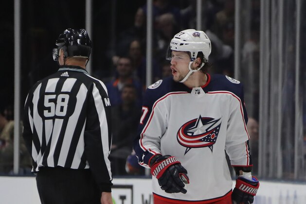 UNIONDALE, NEW YORK - MARCH 11: Josh Anderson #77 of the Columbus Blue Jackets argues a first period penalty during the game against the New York Islanders at the NYCB Live's Nassau Coliseum on March 11, 2019 in Uniondale, New York. (Photo by Bruce Bennett/Getty Images)
