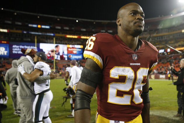 Washington Redskins running back Adrian Peterson (26) walks off the field after the NFL football game between the Washington Redskins and the Philadelphia Eagles, Sunday, Dec. 30, 2018 in Landover, Md. The Eagles defeated the Redskins 24-0. (AP Photo/Andrew Harnik)