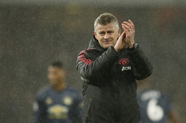 Manchester United manager Ole Gunnar Solskjaer walks in the pitch at the end of the English Premier League soccer match between Arsenal and Manchester United at the Emirates Stadium in London, Sunday, March 10, 2019. (AP Photo/Tim Ireland)