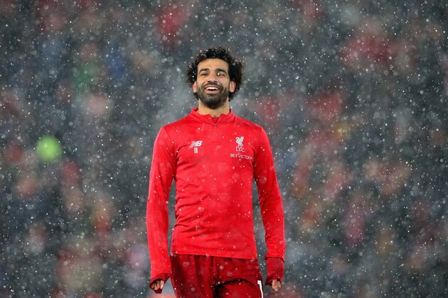 LIVERPOOL, ENGLAND - JANUARY 30:  Mohamed Salah of Liverpool FC looks on in a snow shower during the warm up prior to the Premier League match between Liverpool FC and Leicester City at Anfield on January 30, 2019 in Liverpool, United Kingdom.  (Photo by Alex Livesey - Danehouse/Getty Images)