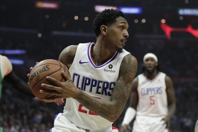 Los Angeles Clippers' Lou Williams looks to pass during the first half of an NBA basketball game against the Boston Celtics Monday, March 11, 2019, in Los Angeles. (AP Photo/Jae C. Hong)