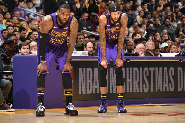 LOS ANGELES, CA - DECEMBER 21: LeBron James #23 and Brandon Ingram #14 of the Los Angeles Lakers take a break during the game against the New Orleans Pelicans on December 21, 2018 at STAPLES Center in Los Angeles, California. NOTE TO USER: User expressly acknowledges and agrees that, by downloading and/or using this Photograph, user is consenting to the terms and conditions of the Getty Images License Agreement. Mandatory Copyright Notice: Copyright 2018 NBAE (Photo by Andrew D. Bernstein/NBAE via Getty Images)