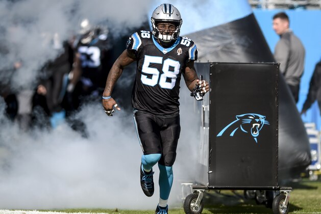 Carolina Panthers outside linebacker Thomas Davis (58) runs onto the field before the start of an NFL football game against the Seattle Seahawks in Charlotte, N.C., Sunday, Nov. 25, 2018. (AP Photo/Mike McCarn)