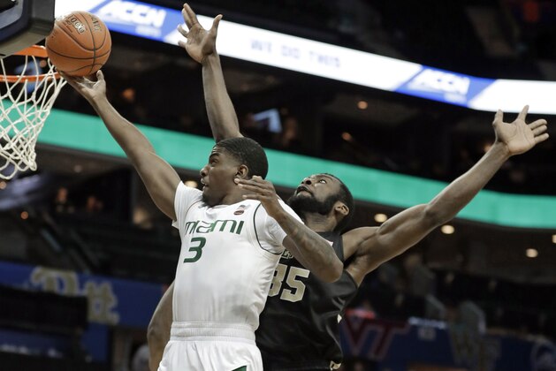 Miami's Anthony Lawrence II (3) drives against Wake Forest's Ikenna Smart (35) during the second half of an NCAA college basketball game in the Atlantic Coast Conference tournament in Charlotte, N.C., Tuesday, March 12, 2019. (AP Photo/Nell Redmond)