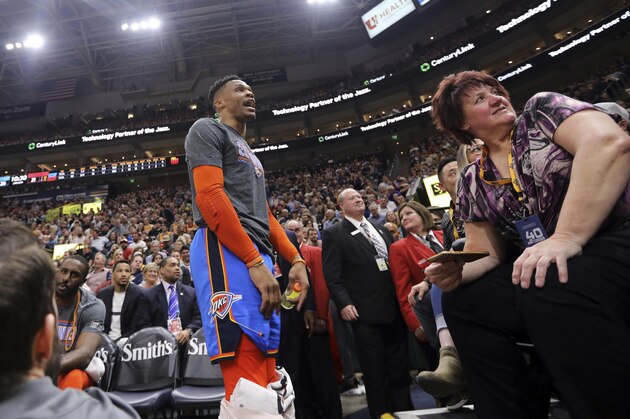 Oklahoma City Thunder's Russell Westbrook gets into a heated verbal altercation with fans in the first half of an NBA basketball game against the Utah Jazz, Monday, March 11, 2019, in Salt Lake City. (AP Photo/Rick Bowmer)