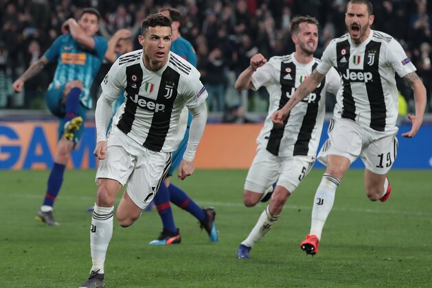 TURIN, ITALY - MARCH 12:  Cristiano Ronaldo of Juventus celebrates his third goal during the UEFA Champions League Round of 16 Second Leg match between Juventus and Club de Atletico Madrid at Allianz Stadium on March 12, 2019 in Turin, Italy.  (Photo by Emilio Andreoli/Getty Images)