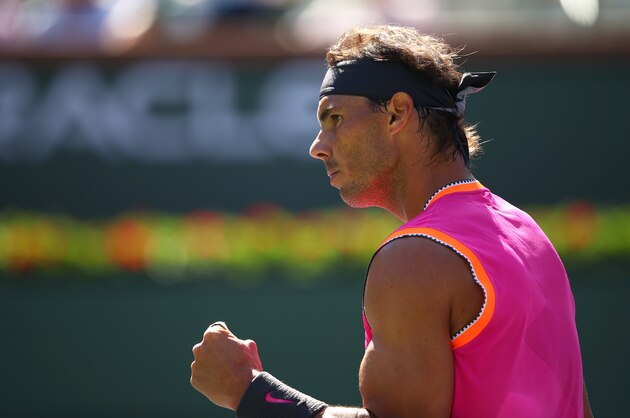 INDIAN WELLS, CALIFORNIA - MARCH 12: Rafael Nadal of Spain celebrates a point against Diego Schwartzman of Argentina during their men's singles third round match on day nine of the BNP Paribas Open at the Indian Wells Tennis Garden on March 12, 2019 in Indian Wells, California. (Photo by Clive Brunskill/Getty Images)