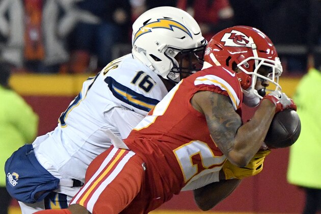 Kansas City Chiefs cornerback Steven Nelson (20) intercepts a pass intended for Los Angeles Chargers wide receiver Tyrell Williams (16) during the first half of an NFL football game in Kansas City, Mo., Thursday, Dec. 13, 2018. (AP Photo/Ed Zurga)
