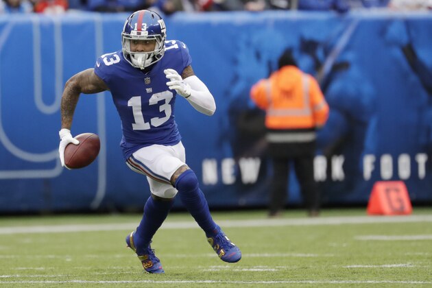 New York Giants' Odell Beckham runs with the ball during the first half of an NFL football game against the Tampa Bay Buccaneers, Sunday, Nov. 18, 2018, in East Rutherford, N.J. (AP Photo/Julio Cortez)