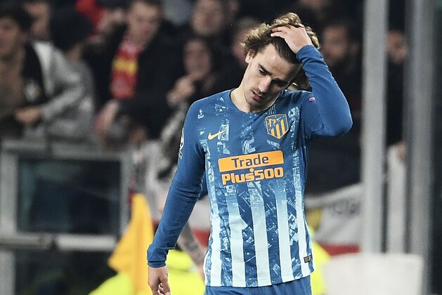 Atletico Madrid's French forward Antoine Griezmann reacts as he leaves the pitch at the end of the UEFA Champions League round of 16 second-leg football match Juventus vs Atletico Madrid on March 12, 2019 at the Juventus stadium in Turin. (Photo by Filippo MONTEFORTE / AFP)        (Photo credit should read FILIPPO MONTEFORTE/AFP/Getty Images)