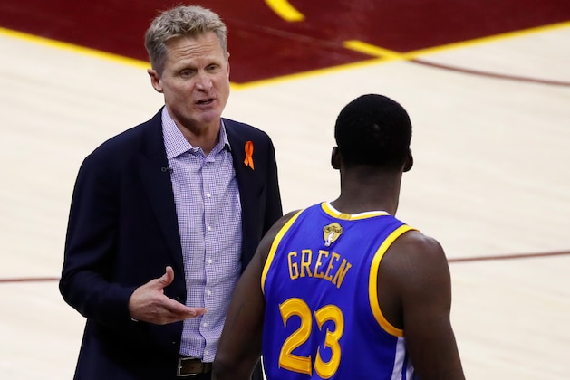 CLEVELAND, OH - JUNE 09:  Steve Kerr and Draymond Green #23 of the Golden State Warriors discuss the play against the Cleveland Cavaliers during the first half in Game 4 of the 2017 NBA Finals at Quicken Loans Arena on June 9, 2017 in Cleveland, Ohio. NOTE TO USER: User expressly acknowledges and agrees that, by downloading and or using this photograph, User is consenting to the terms and conditions of the Getty Images License Agreement.  (Photo by Gregory Shamus/Getty Images)