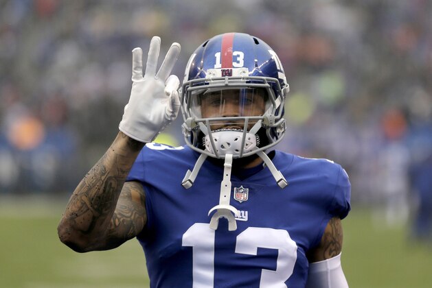 FILE - In this Dec. 2, 2018, file photo, New York Giants wide receiver Odell Beckham Jr. gestures prior to the team's NFL football game against the Chicago Bears in East Rutherford, N.J. Two people familiar with the blockbuster trade say the Cleveland Browns have agreed to acquire Beckham from the Giants. (AP Photo/Seth Wenig, File)