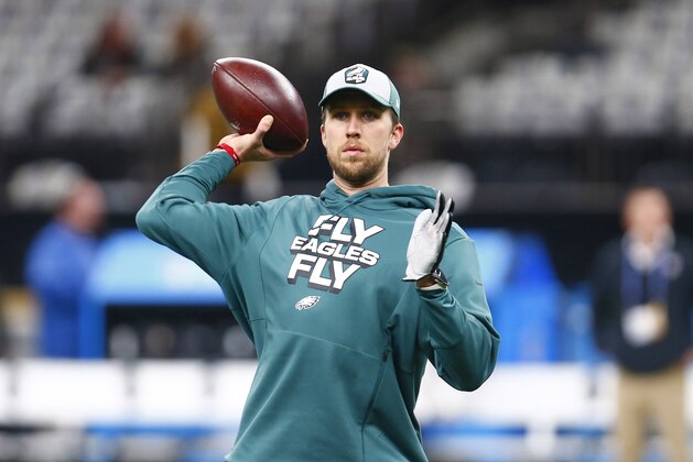 Philadelphia Eagles quarterback Nick Foles warms up before an NFL divisional playoff football game against the New Orleans Saints in New Orleans, Sunday, Jan. 13, 2019. (AP Photo/Butch Dill)